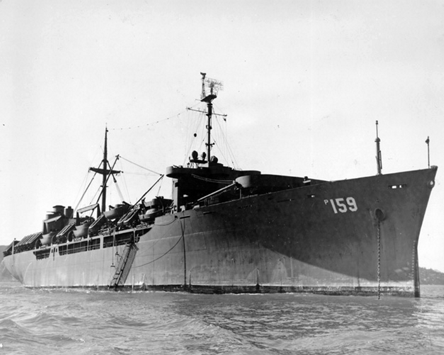 The United States Navy transport USS General Stuart Heintzelman at anchor, photographed about 1945.