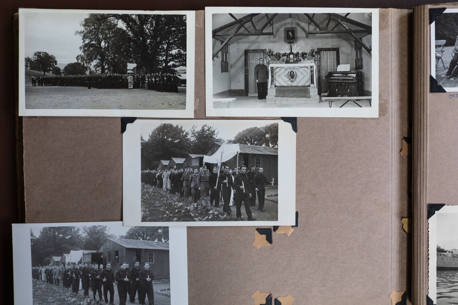 An undated Balhary Estate album page showing a religious procession, an altar and camp huts.