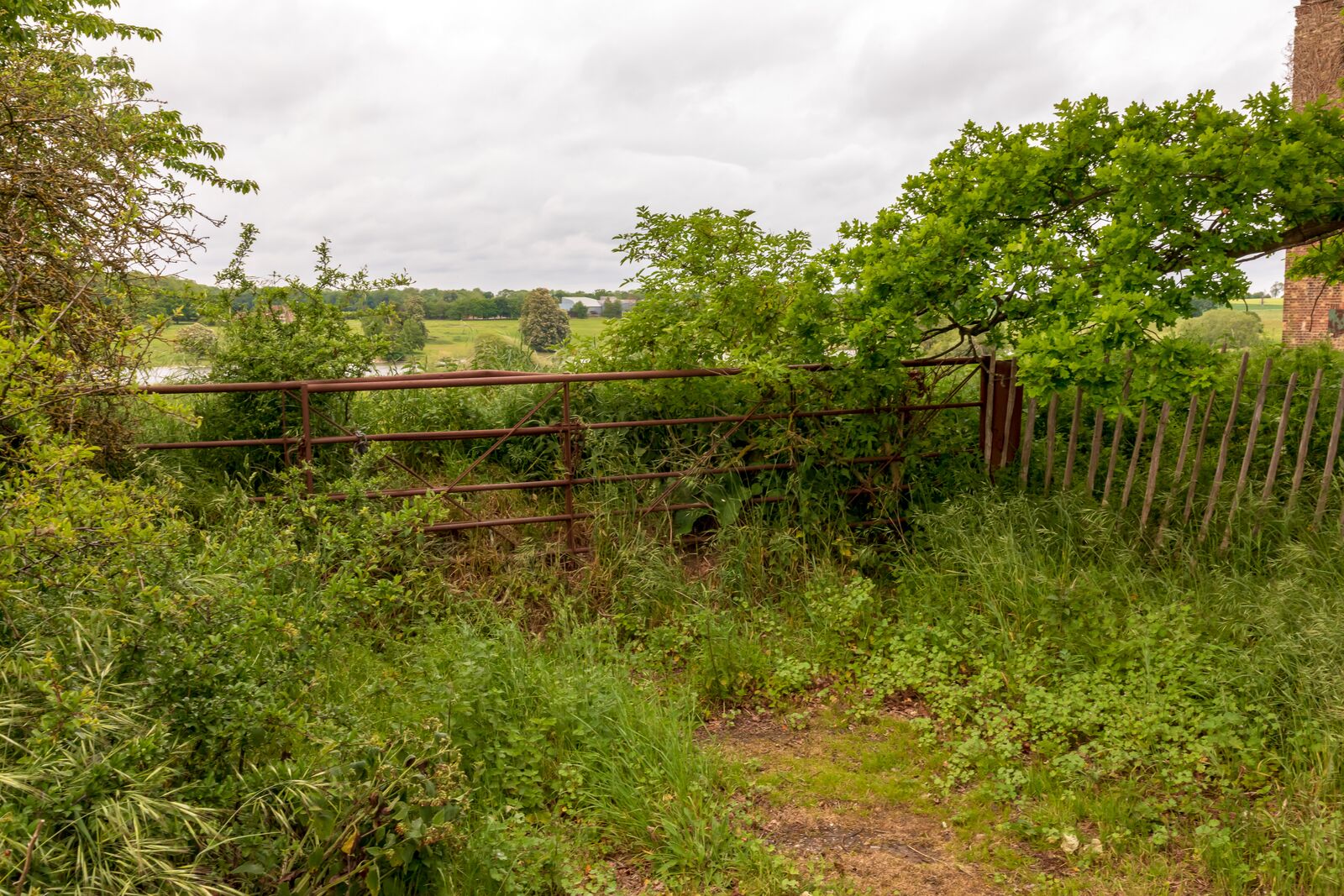 The surviving water tower and former Camp 56 site, May 2019.