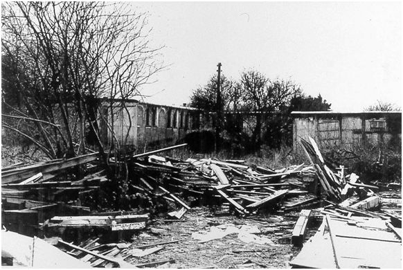 Demolition of former Castle Rankine huts in 1990.