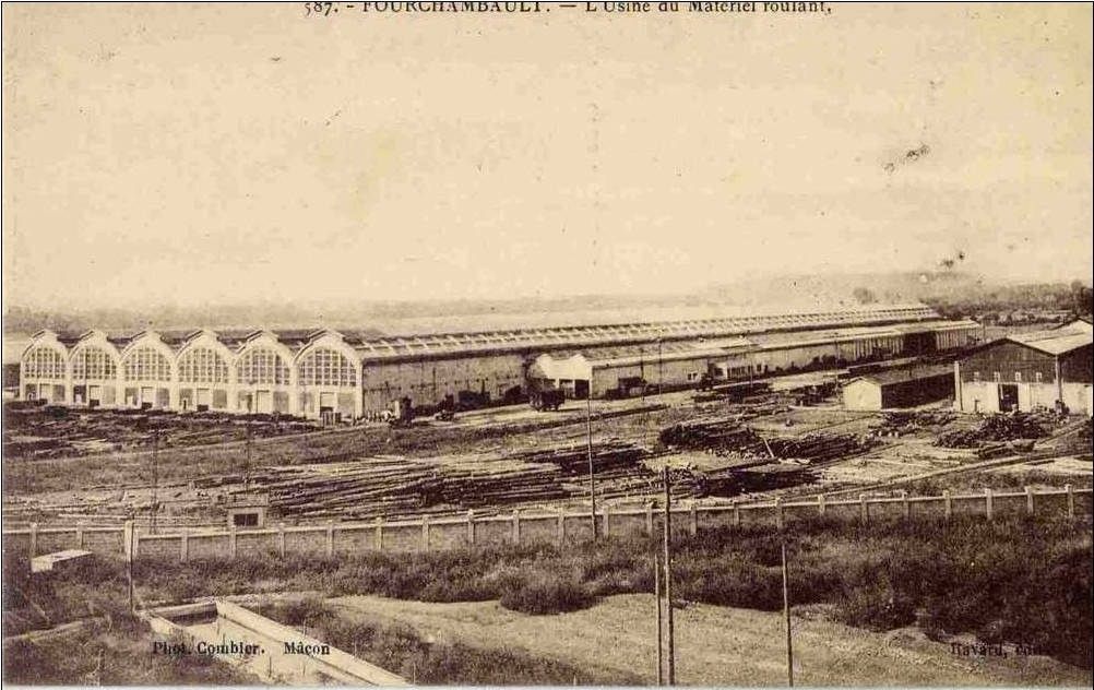 Postcard of the Matériel Roulant factory at Fourchambault, showing a long shed with six arched bays and stacked timber.