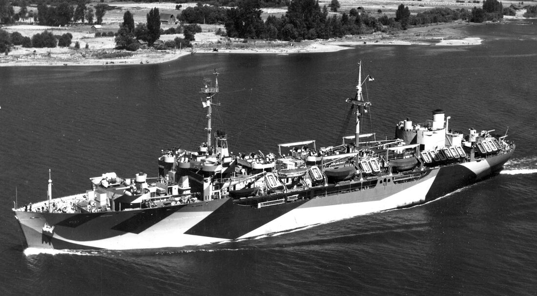 The United States Navy transport USS General S. D. Sturgis under way at sea in July 1944, in dazzle camouflage.
