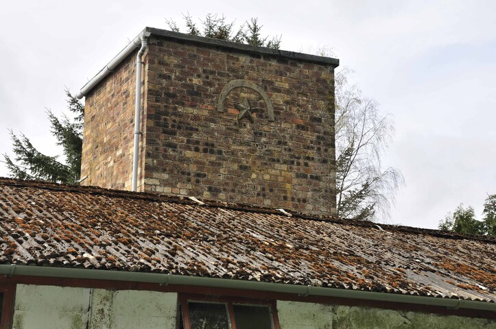 Water tower detail at the Kildary camp, showing a star and crescent.