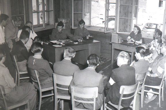 Camp representatives meeting American officers to discuss administration, 20 May 1945.
