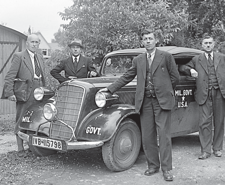 A military-government vehicle outside a Mannheim displaced persons camp in 1946.