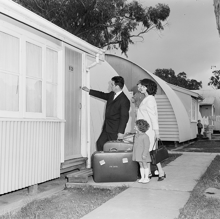 A family entering its new home at Maribyrnong in 1965.