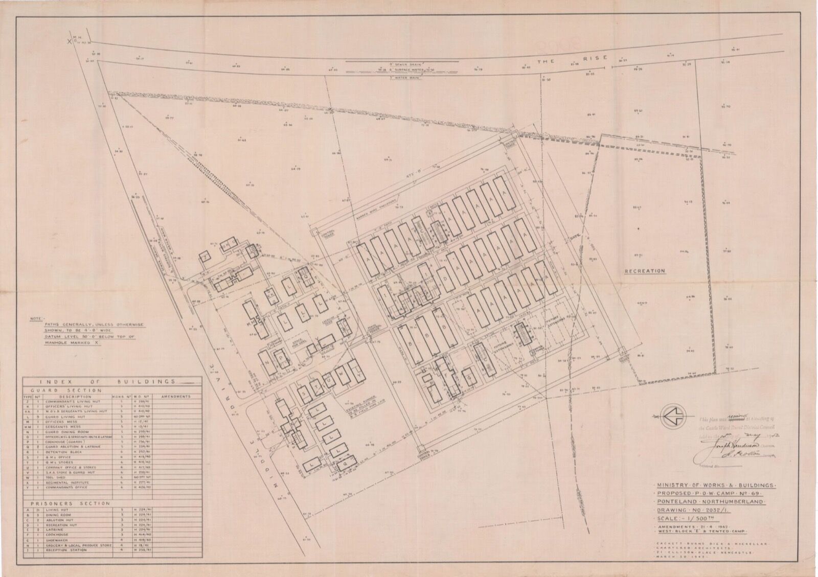 Architect’s site plan on pink paper titled Proposed P.O.W. Camp No. 69, Ponteland, Northumberland, showing a wired compound of parallel huts beside a smaller guard section, with an index of buildings at the lower left.