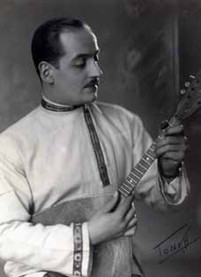 Leon Bunjevic holding a balalaika