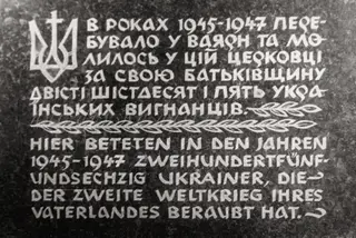 Bilingual chapel plaque commemorating 265 Ukrainians at Weyarn