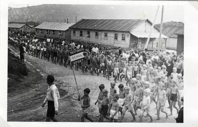 Children assembling for school sports at Treffling Camp.